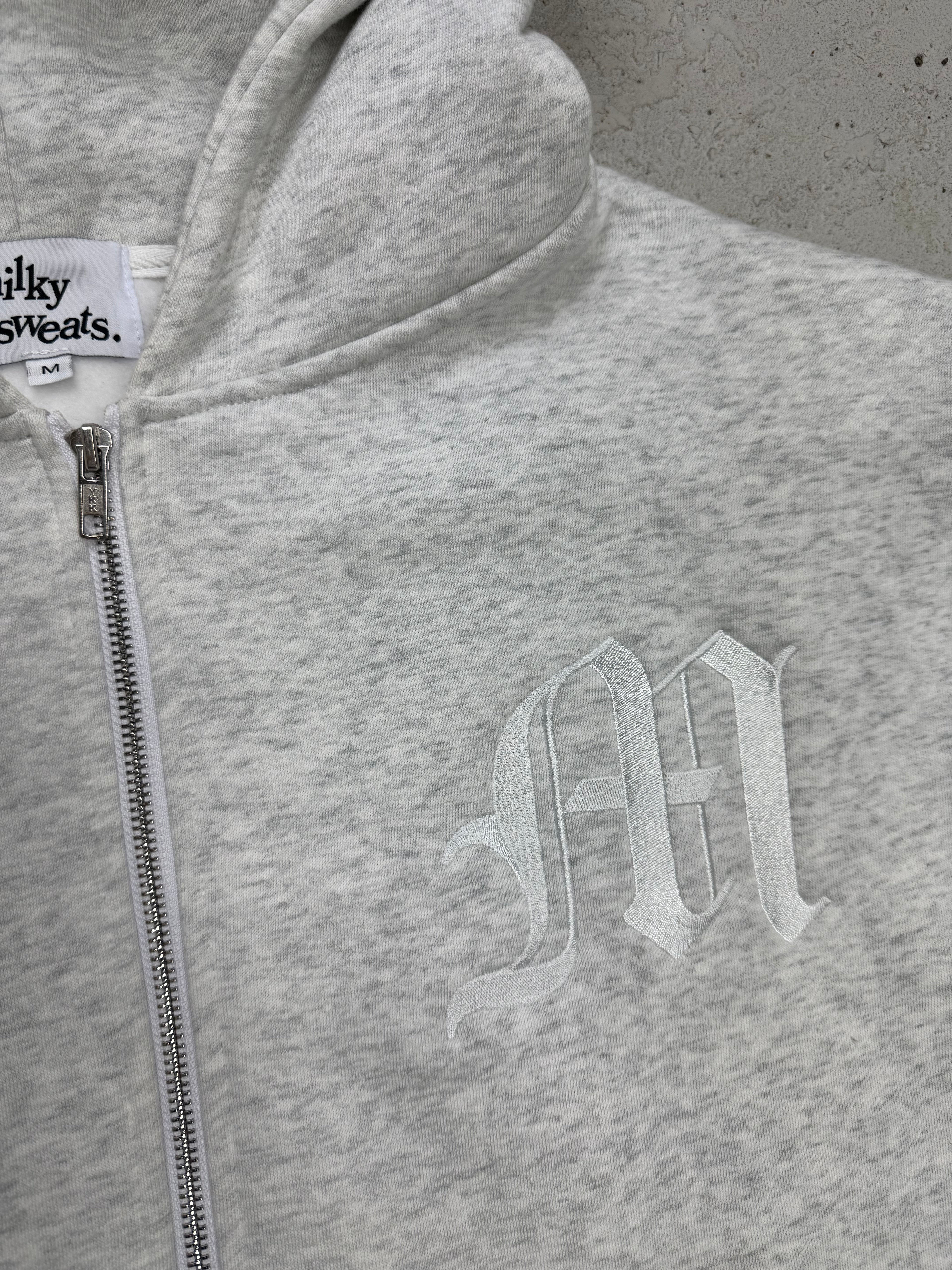 THE ESSENTIAL M ZIP UP