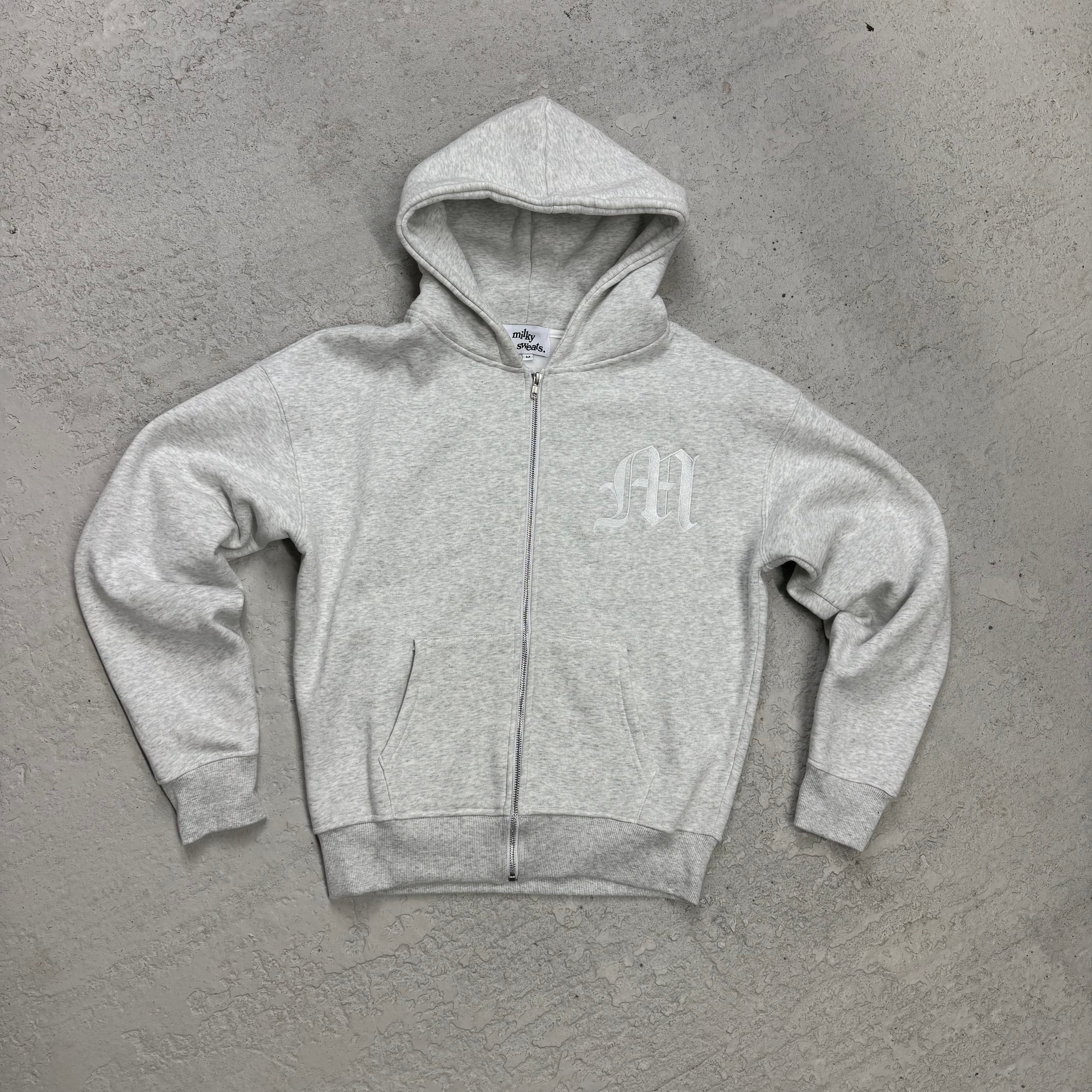 THE ESSENTIAL M ZIP UP